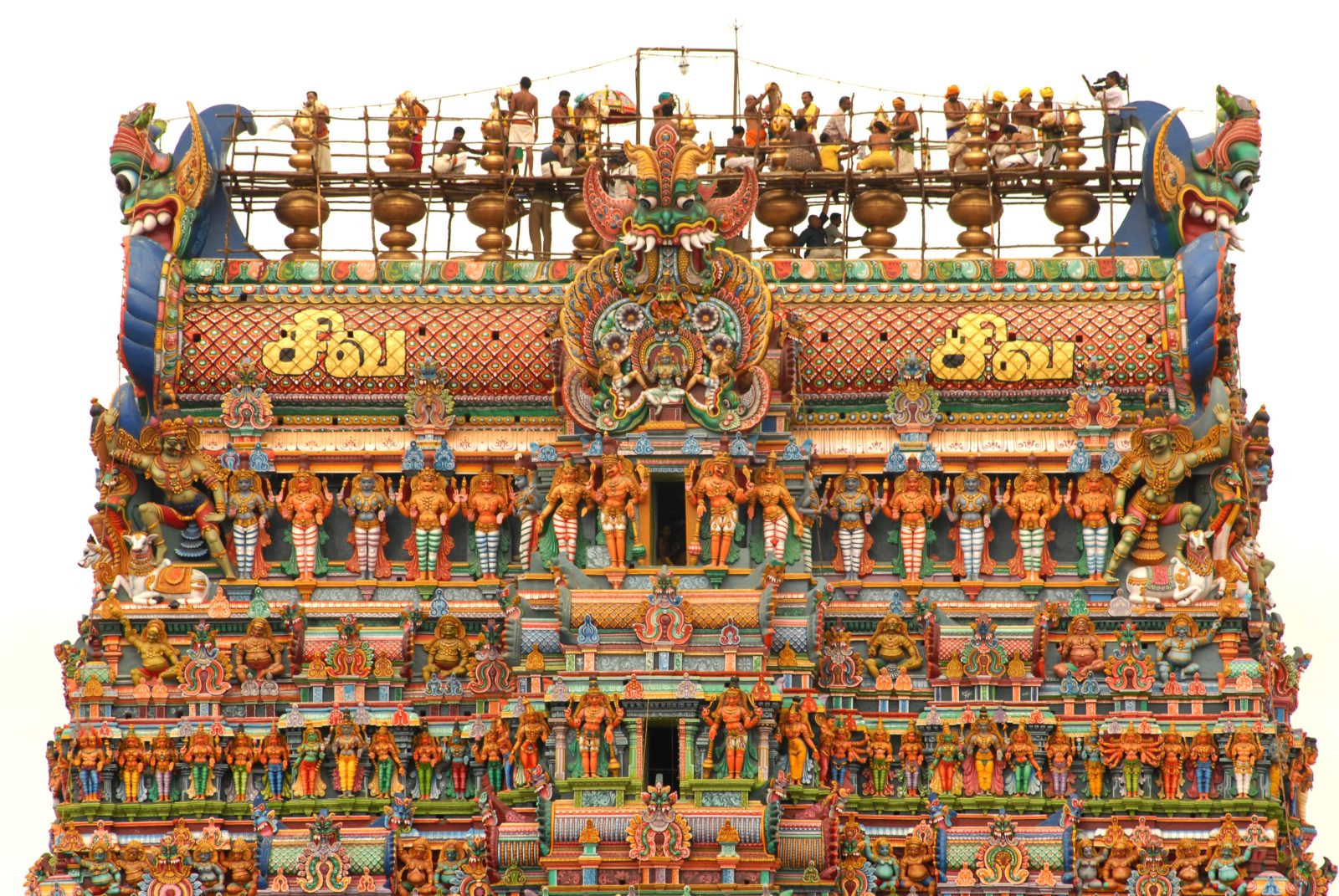 Painted stucco figures on a rajagopuram.